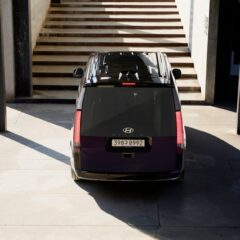 A Hyundai Staria Lounge Hybrid parked outdoors, showcasing modern design and mobility.