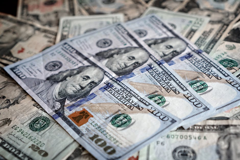 Close-up of various US dollar bills highlighting finance and economy.
