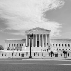 Classic view of the US Supreme Court building in Washington, D.C., highlighting neoclassical architecture.