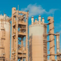 A view of urea towers at an industrial plant in Libya, captured on a clear day.