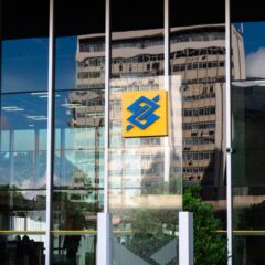 Modern building exterior in Brasília, Brazil, featuring reflective glass and iconic Banco logo.