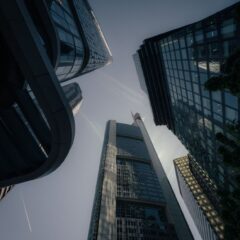Upward view of modern skyscrapers in Frankfurt, capturing the city's impressive architecture.