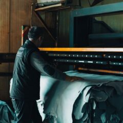 Leathercraft worker processing hides in Gerede tannery, Türkiye.